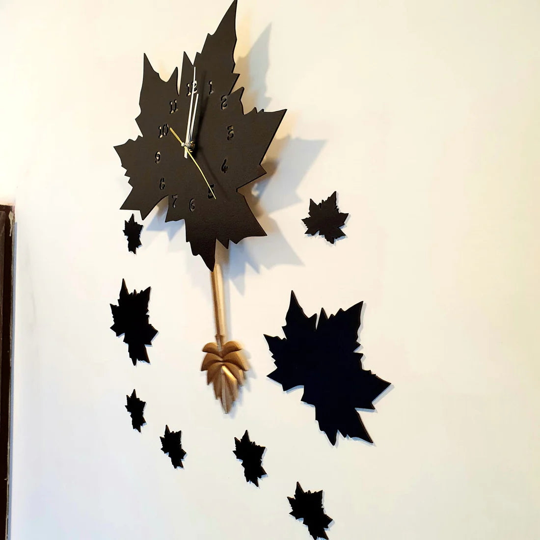 Black Maple Leaf Wall Clock with Pendulum DECOR DARBARS